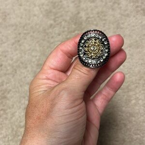 Ring- costume jewelry, black and gold, adjustable size.